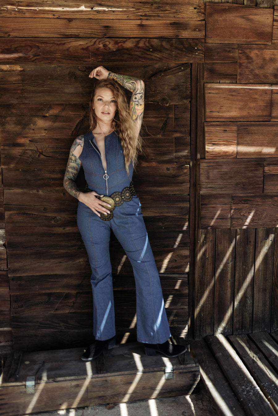 Love Kills Denim Flare Jumpsuit